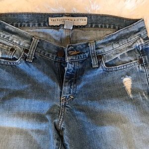Faded distressed Abercrombie jeans.